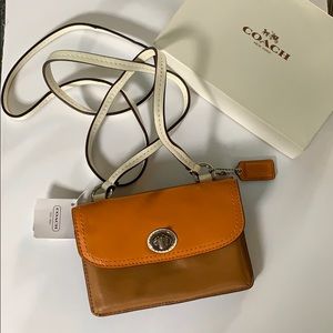 Coach crossbody leather wallet. Brand new w tags!